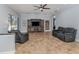 Comfortable Gathering room with reclining sofas and entertainment center at 5515 Reisterstown Rd, North Port, FL 34291