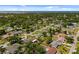 Aerial view of property and surrounding neighborhood at 566 Viridian St, Englewood, FL 34223