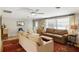 Living room with two sofas, a coffee table and decorative rug at 566 Viridian St, Englewood, FL 34223