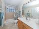 Clean bathroom with a tub, shower, and updated vanity at 344 Bermuda Ct # 4, Venice, FL 34293