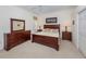 Large bedroom with a king-size bed and plenty of storage at 344 Bermuda Ct # 4, Venice, FL 34293