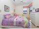 Charming bedroom with twin beds and plenty of light at 344 Bermuda Ct # 4, Venice, FL 34293