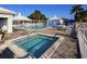 Resort-style pool and spa with ample lounge chairs at 344 Bermuda Ct # 4, Venice, FL 34293