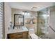 Bathroom with walk-in shower and single vanity at 429 Wexford Cir # 75, Venice, FL 34293