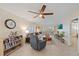 Comfortable living room featuring a brown sofa and recliner at 429 Wexford Cir # 75, Venice, FL 34293