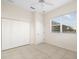 Bedroom with double door closet and window with blinds at 664 Silk Oak Dr, Venice, FL 34293