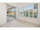 Bright breakfast nook with sliding glass doors and window shutters at 664 Silk Oak Dr, Venice, FL 34293