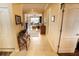 Hallway with view of living room and access to other rooms at 11613 Marathon Cir, Venice, FL 34293