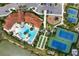 Aerial view of community pool, tennis courts, playground at 11684 Renaissance Blvd, Venice, FL 34293