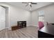 Bright home office with built-in shelving and wood floors at 11684 Renaissance Blvd, Venice, FL 34293