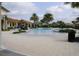 Resort-style pool with surrounding lounge chairs at 11684 Renaissance Blvd, Venice, FL 34293