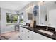 Updated bathroom with double vanity and large shower at 5885 Denison Dr, Venice, FL 34293