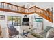 Open living space with water views and comfortable seating at 5885 Denison Dr, Venice, FL 34293