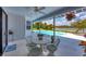 Relaxing patio area with seating and pool views at 5885 Denison Dr, Venice, FL 34293
