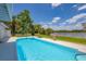 Inviting pool with lake views at 5885 Denison Dr, Venice, FL 34293