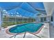 Refreshing screened-in pool and patio area at 5891 Madison Rd, Venice, FL 34293