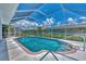 Screened-in pool with brick coping at 5891 Madison Rd, Venice, FL 34293