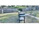 Large backyard with grill and brick pathway at 3781 Wayward Ave, North Port, FL 34286