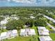 Aerial view of a single-Gathering home with surrounding landscape at 1840 Vera Pl # 81, Sarasota, FL 34235