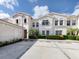 Two-story building with parking and lush landscaping at 501 Ravinia Cir # 501, Venice, FL 34292