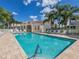 Community pool with plenty of lounge chairs at 501 Ravinia Cir # 501, Venice, FL 34292
