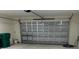 Garage with automatic opener and extra storage space at 7097 Plantation St, Englewood, FL 34224