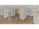 Kitchen and dining area with hardwood floors at 1411 Strada D Argento, Venice, FL 34292