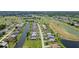 Aerial view showing home's location in a golf course community at 9 Bunker Ln, Rotonda West, FL 33947