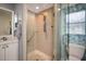 Modern bathroom with walk-in shower, grab bar, and glass enclosure at 9 Bunker Ln, Rotonda West, FL 33947