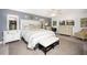 Spacious bedroom with a king-size bed and en-suite bathroom at 9 Bunker Ln, Rotonda West, FL 33947