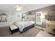 Comfortable bedroom with a king-size bed and access to the bathroom at 9 Bunker Ln, Rotonda West, FL 33947