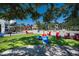 Relaxing community lawn with red chairs at 9 Bunker Ln, Rotonda West, FL 33947