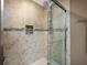 Walk-in shower with tile surround at 9 Bunker Ln, Rotonda West, FL 33947