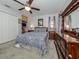 Main bedroom with a queen-size bed and ample closet space at 21019 Lawson Ave, Port Charlotte, FL 33952