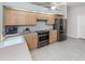 Well-equipped kitchen, stainless steel appliances, light wood cabinets at 21019 Lawson Ave, Port Charlotte, FL 33952