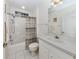 Bathroom with tub, toilet and vanity at 4522 Cancello Grande Ave, Venice, FL 34293