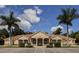 Community clubhouse with parking in front at 4522 Cancello Grande Ave, Venice, FL 34293