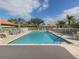 Inviting community pool with lounge chairs at 4522 Cancello Grande Ave, Venice, FL 34293