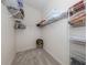 Large walk-in closet with wire shelving and ample storage at 4522 Cancello Grande Ave, Venice, FL 34293
