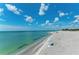 Scenic view of Venice Beach with clear water and blue sky at 5864 Tyler Rd, Venice, FL 34293