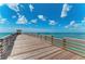 Wooden fishing pier extending into the ocean at 5864 Tyler Rd, Venice, FL 34293
