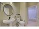 Bathroom with pedestal sink, toilet and shower at 1586 Monarch Dr # 1586, Venice, FL 34293