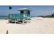 Beachfront property with lifeguard stand and sandy beach at 1586 Monarch Dr # 1586, Venice, FL 34293
