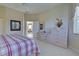Bright bedroom with access to another room at 1586 Monarch Dr # 1586, Venice, FL 34293