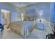 Bedroom with ensuite bathroom and window at 1586 Monarch Dr # 1586, Venice, FL 34293