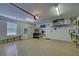 Spacious garage with storage shelving and flooring at 1586 Monarch Dr # 1586, Venice, FL 34293