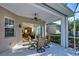 Enjoy dining alfresco on this screened patio with interior views at 1586 Monarch Dr # 1586, Venice, FL 34293