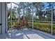 Spacious screened porch with seating area, perfect for outdoor relaxation at 1586 Monarch Dr # 1586, Venice, FL 34293