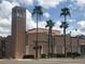 Venice Theatre building with palm trees at 1586 Monarch Dr # 1586, Venice, FL 34293