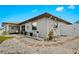 Landscaped side yard with stone pathway and potted plants at 270 Capri Ave, Venice, FL 34293